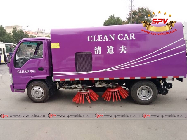 purple garbage truck