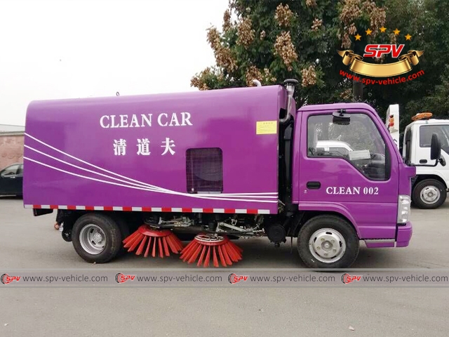 purple garbage truck